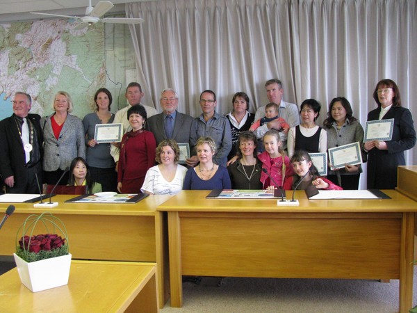 Taupo Mayor Rick Cooper (far left) welcomes 18 new Taupoeans as NZ Citizens